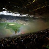 DORTMUND, GERMANY - SEPTEMBER 17: A general view inside the stadium as Borussia Dortmund fans show their support prior to the Bundesliga match between Borussia Dortmund and FC Schalke 04 at Signal Iduna Park on September 17, 2022 in Dortmund, Germany. (Photo by Lars Baron/Getty Images)