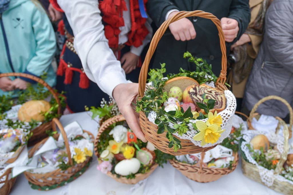 Baskets containing a sampling of Easter foods are brought outside Mariacki Basilica in Krakow to be blessed on Holy Saturday by the Archbishop of Cracow, Marek Jedraszewski. 
The blessing of the Easter baskets -Swieconka ceremony, is the one of the most enduring and beloved Polish traditions on Holy Saturday with origines dating back to the early history of Poland.
On Saturday, April 15, 2017, in Krakow, Poland. (Photo by Artur Widak/NurPhoto via Getty Images)