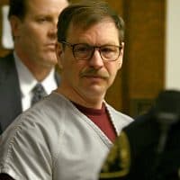 SEATTLE - DECEMBER 18:  Gary Ridgway prepares to leave the courtroom where he was sentenced in King County Washington Superior Court December 18, 2003 in Seattle, Washington. Ridgway received 48 life sentences, with out the possibility of parole, for killing 48 women over the past 20 years in the Green River Killer serial murder case.  (Photo by Josh Trujillo-Pool/Getty Images)