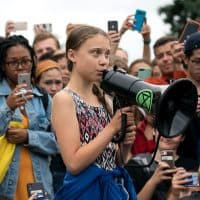 WASHINGTON, DC - SEPTEMBER 13:  Teenage Swedish climate activist Greta Thunberg delivers brief remarks surrounded by other student environmental advocates during a strike to demand action be taken on climate change outside the White House on September 13, 2019 in Washington, DC. The strike is part of Thunberg's six day visit to Washington ahead of the Global Climate Strike scheduled for September 20. (Photo by Sarah Silbiger/Getty Images)
