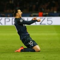 PARIS, FRANCE - FEBRUARY 16:  Zlatan Ibrahimovic of Paris Saint Germain celebrates after he scores during the UEFA Champions League Round of 16 First Leg match between Paris Saint-Germain and Chelsea at Parc des Princes on February 16, 2016 in Paris, France. (Photo by Ian MacNicol/Getty Images)