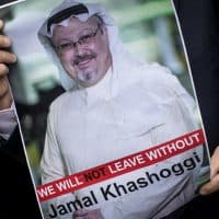 ISTANBUL, TURKEY - OCTOBER 08:  A man holds a poster of Saudi journalist Jamal Khashoggi during a protest organized by members of the Turkish-Arabic Media Association at the entrance to Saudi Arabia's consulate on October 8, 2018 in Istanbul, Turkey. Fears are growing over the fate of missing journalist Jamal Khashoggi after Turkish officials said they believe he was murdered inside the Saudi consulate. Saudi consulate officials have said that missing writer and Saudi critic Jamal Khashoggi went missing after leaving the consulate, however the statement directly contradicts other sources including Turkish officials. Jamal Khashoggi a Saudi writer critical of the Kingdom and a contributor to the Washington Post was living in self-imposed exile in the U.S.  (Photo by Chris McGrath/Getty Images)