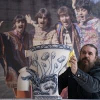 Roag Best gives a final polish to John Lennon's toilet from his Tittenhurst Estate in Berkshire, where he lived with Yoko Ono in 1971, ahead of the item going on display at the Liverpool Beatles Museum. Picture date: Thursday December 8, 2022. (Photo by Danny Lawson/PA Images via Getty Images)