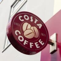 Beckenham, England - May 8, 2011: Projecting sign on a branch of the Costa Coffee chain of coffee shops, in Beckenham, Kent (South East London). Costa Coffee was set up in 1971 in Lambeth, south London, by brothers Sergio and Bruno Costa who supplied caterers and coffee shops from their coffee roastery. They expanded into retailing in 1978, opening their first shop in Vauxhall and the company (now owned by Whitbread) has around 1175 outlets in the UK.