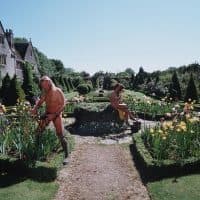 MARLBOROUGH, ENGLAND- JUNE 2002: Naked gardeners Ian and Barbara Pollard tend to their gardens at home in Marlborough during  June 2002 in England. (Photo by John Rogers/Getty Images)