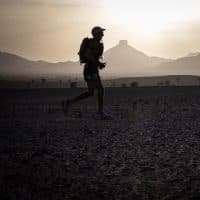 Competitors take part in stage 4 of the 37th edition of the Marathon des Sables between Jebel Zireg and Jdaid in the Moroccan Sahara desert, near Ramlia central Morocco, on April 26, 2023. The 37th edition of the marathon is a live stage 250 kilometres race through a formidable landscape in one of the world's most inhospitable climates. (Photo by JEAN-PHILIPPE KSIAZEK / AFP)