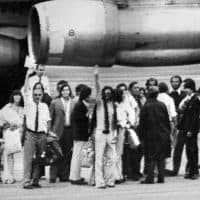 Photo dated 20 December 1972 showing the 16 Urugayans survivors of a plane crash in the Andies on their return to Montevideo. They were rescued after spending 70 days in the mountains and, in order to survive, had to practice cannibalism. (Photo by AFP)