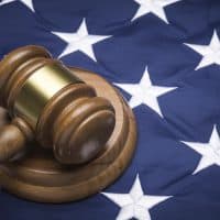 Gavel on American flag, close up