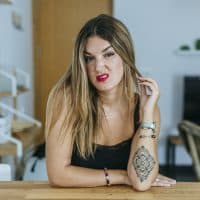 Portrait of woman with angry face in home's living room