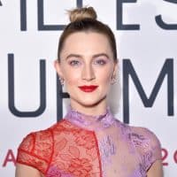 PARIS, FRANCE - DECEMBER 12:  Saoirse Ronan attends the "Little Women" Premiere at Cinema Gaumont Marignan on December 12, 2019 in Paris, France. (Photo by Stephane Cardinale - Corbis/Corbis via Getty Images)