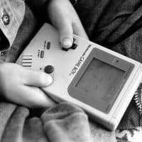 London - A boy playing on one of the first Nintendo Game Boy computers (Photo by In Pictures Ltd./Corbis via Getty Images)
