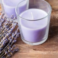 Dry lavender flowers and candle lavender color