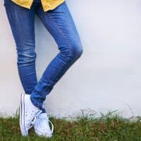 Cropped shot of a young woman standing outside