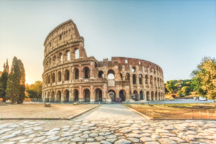 The Colosseum in Rome, Italy, during sunrise in July.
