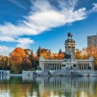 Madrid Spain, sunrise city skyline at El Retiro Park with autumn foliage season