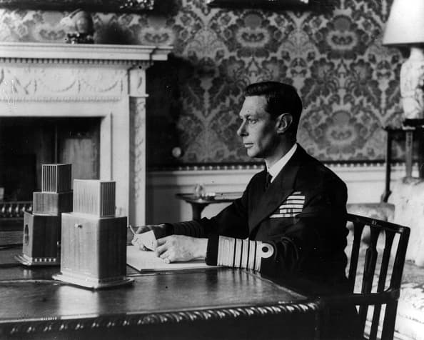 King George VI addresses the people of Britain and the British Empire live over BBC news radio networks at 6pm on Sunday 3rd September 1939, the day of Britain's declaration of war on Nazi Germany. During his speech the king asked his subjects to "stand calm and firm and united in this time of trial".  (Photo by Fox Photos/Hulton Archive/Getty Images)
