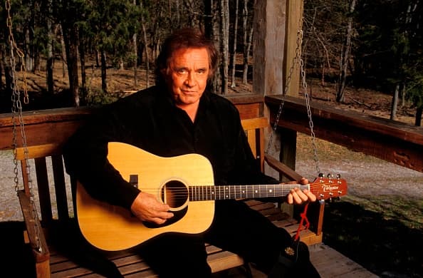 UNITED STATES - JANUARY 01:  NASHVILLE  Photo of Johnny CASH, Posed portrait of Johnny Cash with Takamine acoustic guitar  (Photo by Beth Gwinn/Redferns)