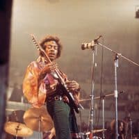 American rock guitarist and singer Jimi Hendrix (1942-1970) performs live on stage playing a black Fender Stratocaster guitar with The Jimi Hendrix Experience at the Royal Albert Hall in London on 24th February 1969. (Photo by David Redfern/Redferns)