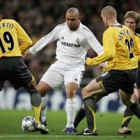 MADRID, SPAIN - FEBRUARY 21:  Ronaldo of Madrid is kept under pressure by Philippe Senderos and Gilberto of Arsenal during the UEFA Champions League Round of 16, First Leg match between Real Madrid and Arsenal at the Santiago Bernabeu Stadium on February 21, 2006 in Madrid, Spain.  (Photo by Richard Heathcote/Getty Images)