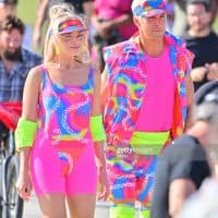 LOS ANGELES CA - JUNE 27:  Margot Robbie and Ryan Gosling on rollerblades film new scenes for 'Barbie' in Venice California. 27 Jun 2022. (Photo by MEGA/GC Images)