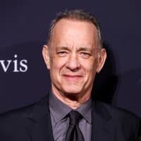 Tom Hanks arrives at the Pre-Grammy Gala held at The Beverly Hilton on February 4, 2023 in Beverly Hills, California. (Photo by Mark Von Holden/Variety via Getty Images)