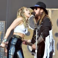 GLASTONBURY, ENGLAND - JUNE 30: Billy Ray Cyrus performs with Miley Cyrus on The Pyramid Stage during day five of Glastonbury Festival at Worthy Farm, Pilton on June 30, 2019 in Glastonbury, England. (Photo by Shirlaine Forrest/WireImage)