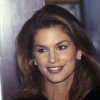 NEW YORK CITY - OCTOBER 18:   Model Cindy Crawford autographs copies of her book "Cindy Crawford's Basic Face" on October 18, 1996 at Barnes &amp; Noble, Rockefeller Center in New York City. (Photo by Ron Galella, Ltd./Ron Galella Collection via Getty Images)