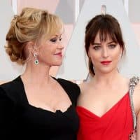 HOLLYWOOD, CA - FEBRUARY 22: (L-R) Melanie Griffith and Dakota Johnson arrive at the 87th Annual Academy Awards at Hollywood &amp; Highland Center on February 22, 2015 in Los Angeles, California. (Photo by Dan MacMedan/WireImage)