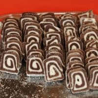 Slices of chocolate and coconut roll cake