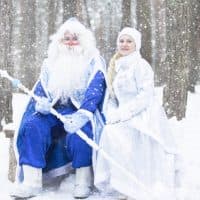 Russian Father Frost and Snow Maiden in the winter forest.Santa Claus Russian