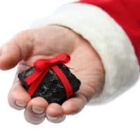 coal lump with red ribbon, christmas present for bad boys and bad girls
