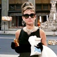 NEW YORK - OCTOBER 5: The movie "Breakfast at Tiffany's", directed by Blake Edwards and based on the novel by Truman Capote. Seen here, Audrey Hepburn as Holly Golightly during the opening sequence, pausing in front of Tiffany's jewelry store in New York City. Initial theatrical release October 5, 1961. Screen capture. Paramount Pictures. (Photo by CBS via Getty Images)